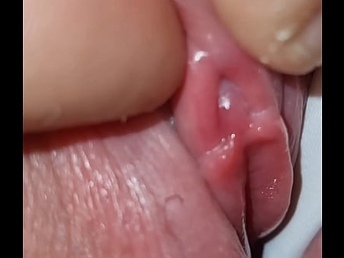 Hiden behind her gorgeous cameltoe I found her little clit I play with till she cums